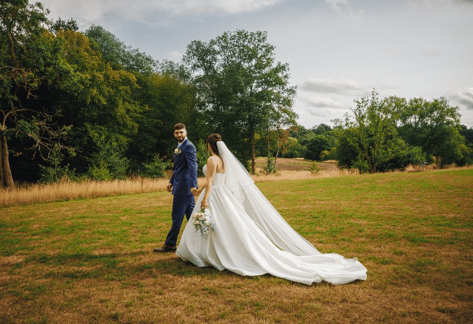 Couple dancing in field