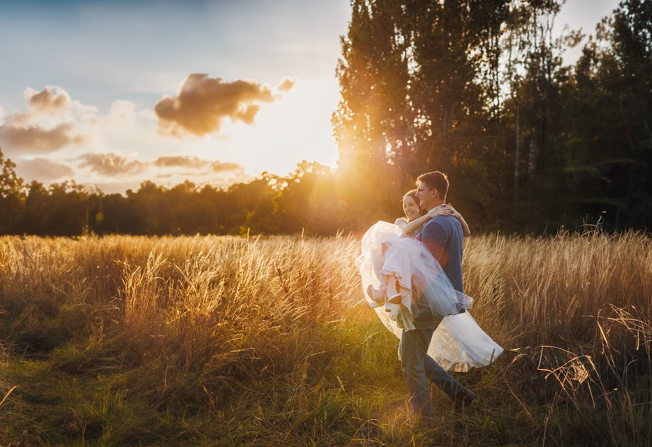Couple dancing in field