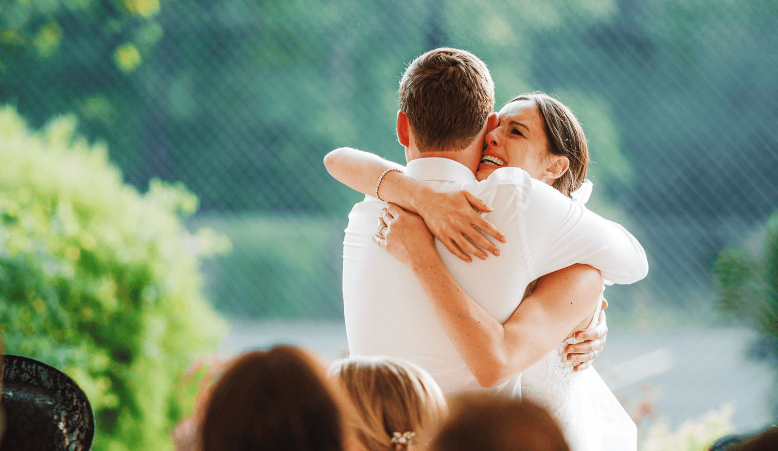 Newly wed couple hugging