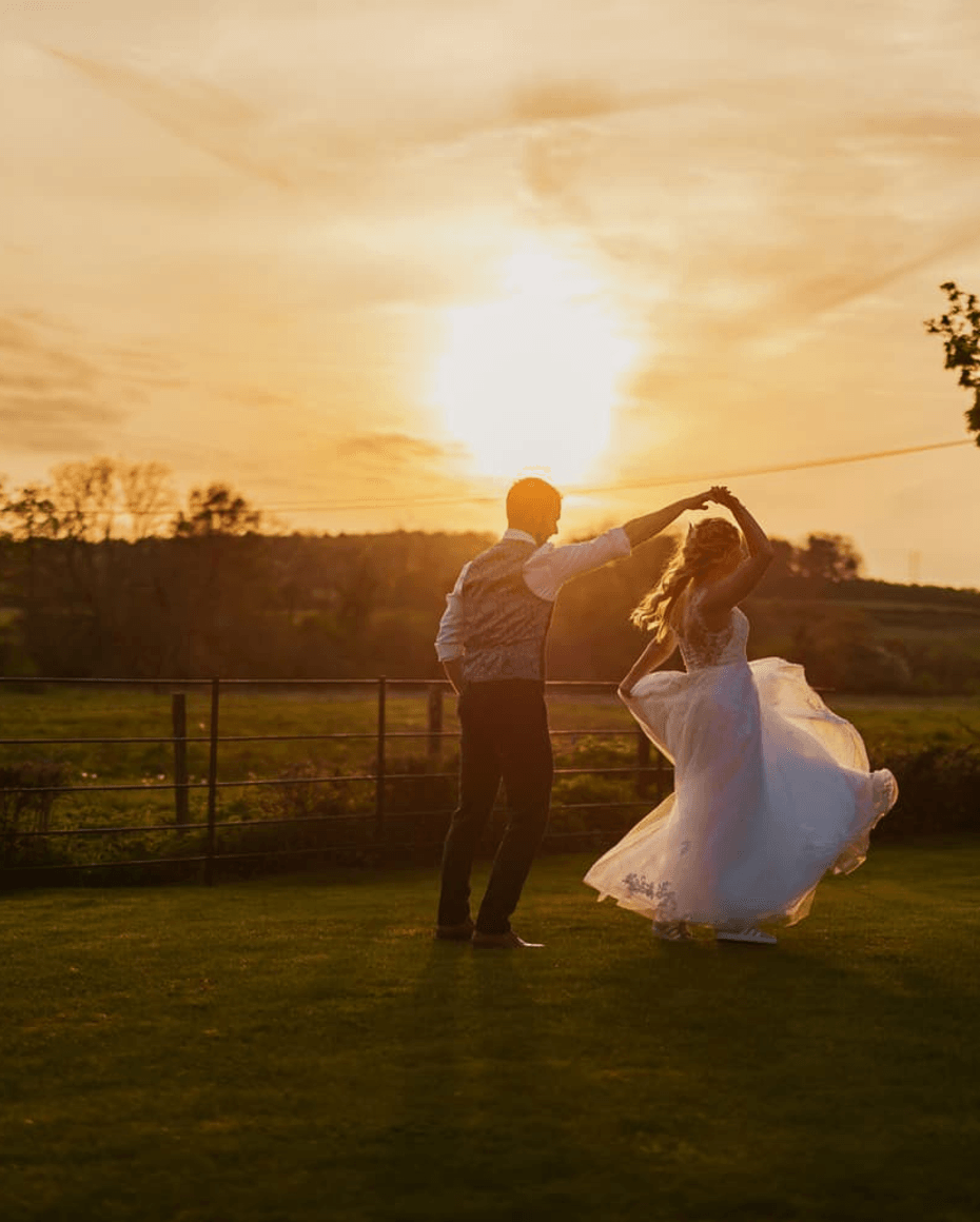 Elvetham Hotel Wedding couple in the fields