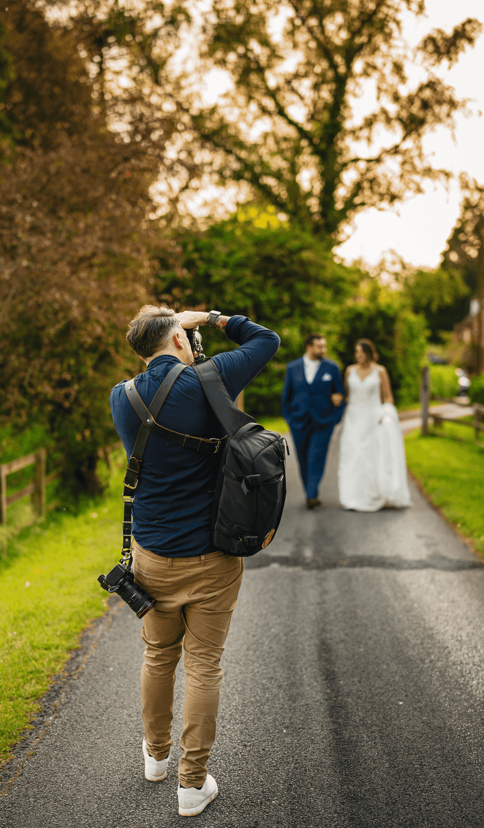 Philip take pics of couple in road