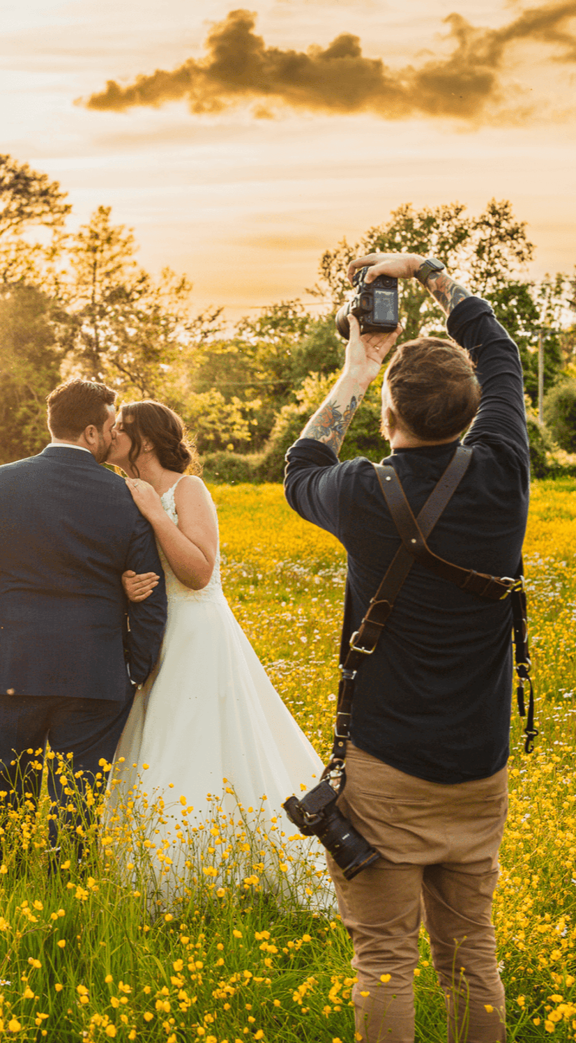 Phil shooting newly wed couple in field