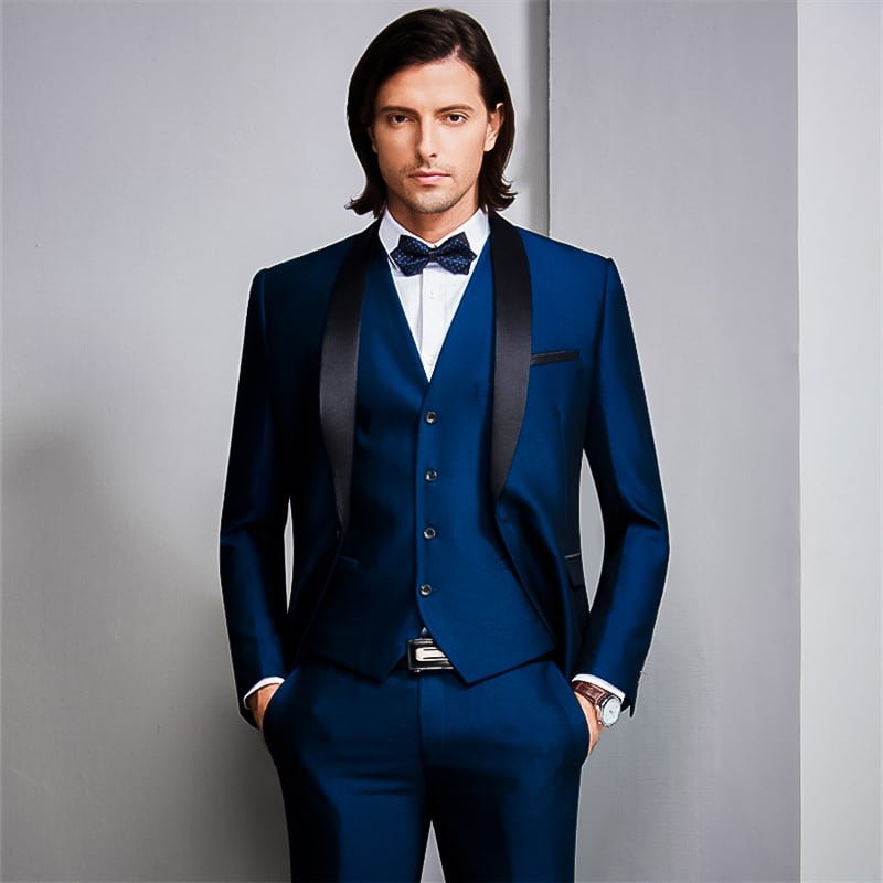Navy blue tuxedo with satin lapels and black bow tie