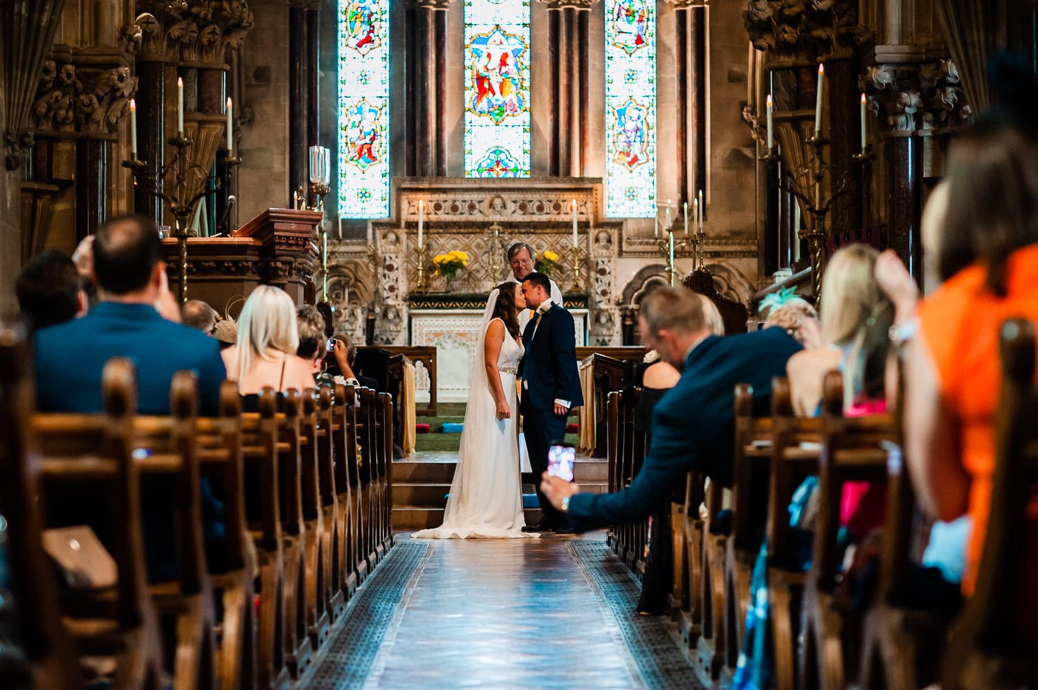 Sign asking wedding guests to be present in the moment, not on their phones