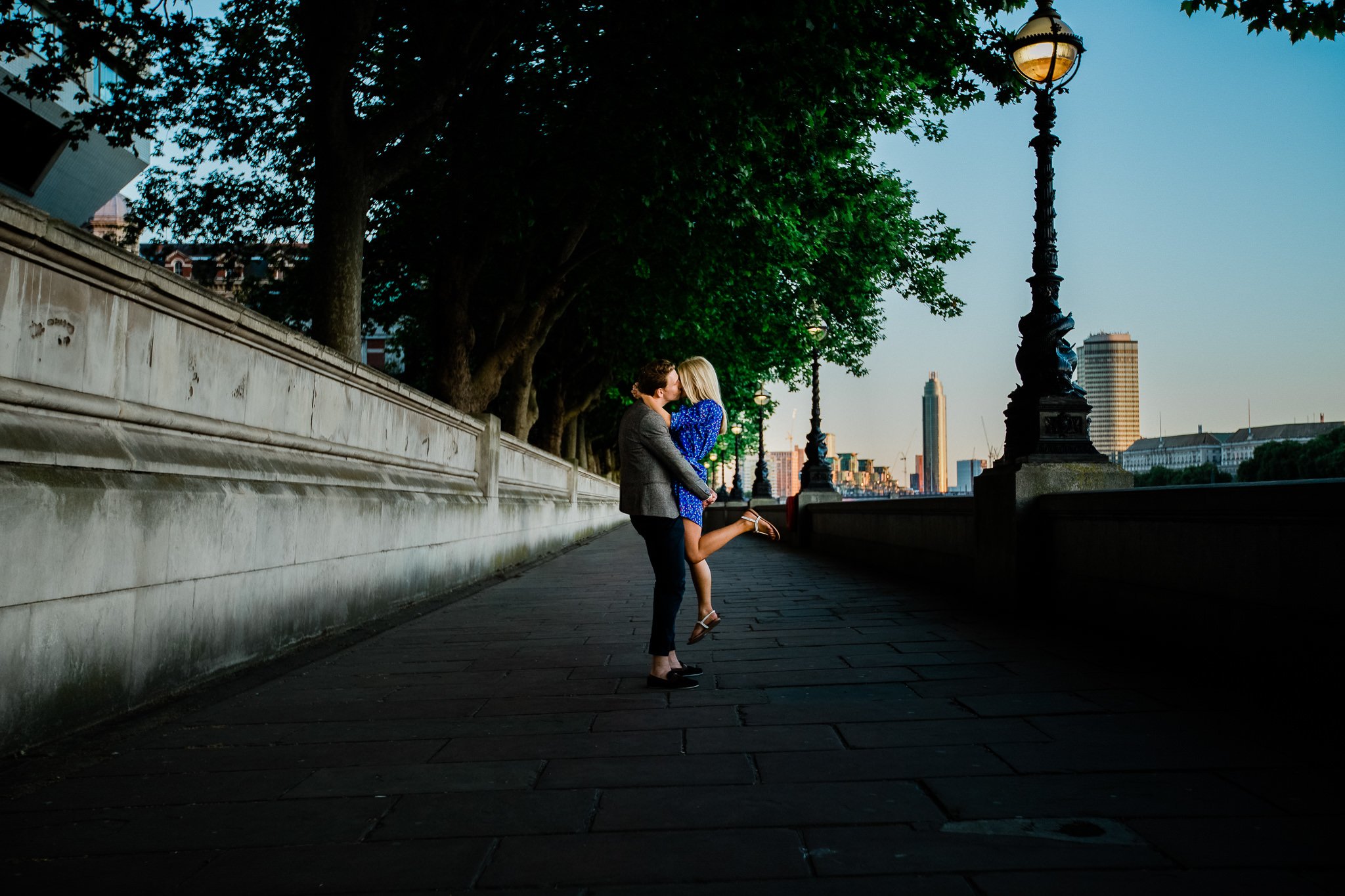 Couple in layered casual outfits at Hampshire countryside engagement session